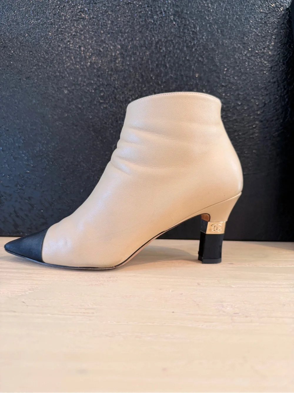 CHANEL Beige Leather Ankle Boots with Black Cap Toe